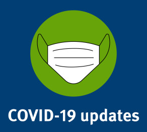 An illustration of a face mask with text that reads: COVID-19 updates
